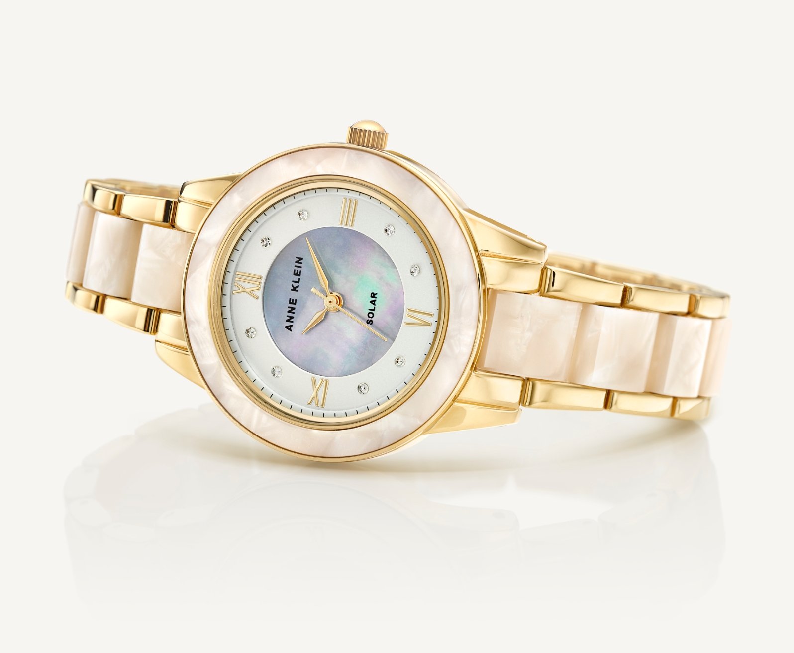 Anne Klein Gold and White Solar Powered Resin Watch